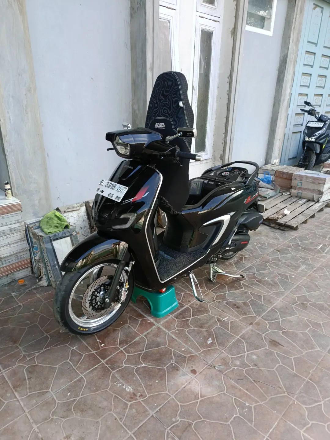 @XII.