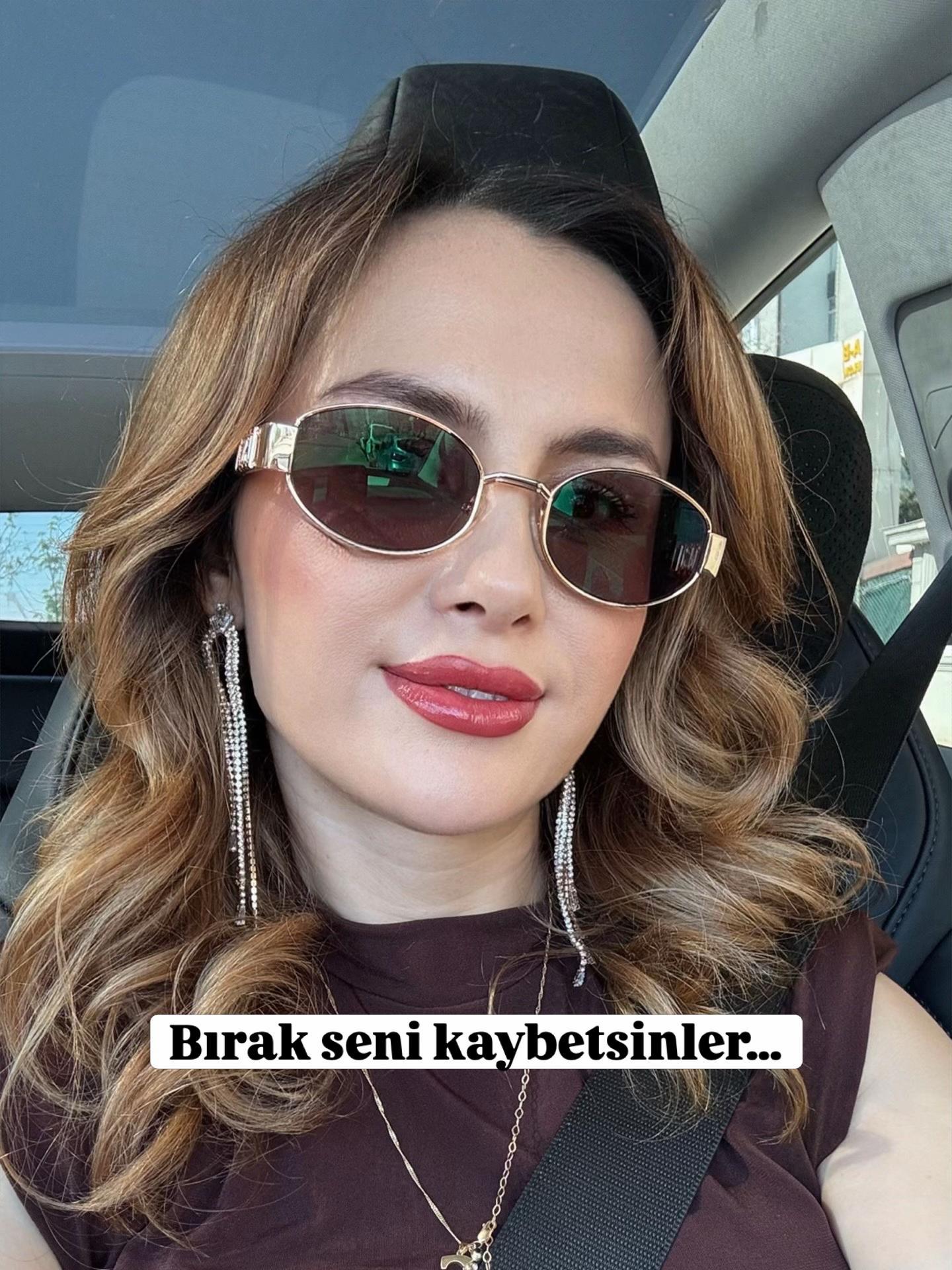 @&Ouml;zge Akca