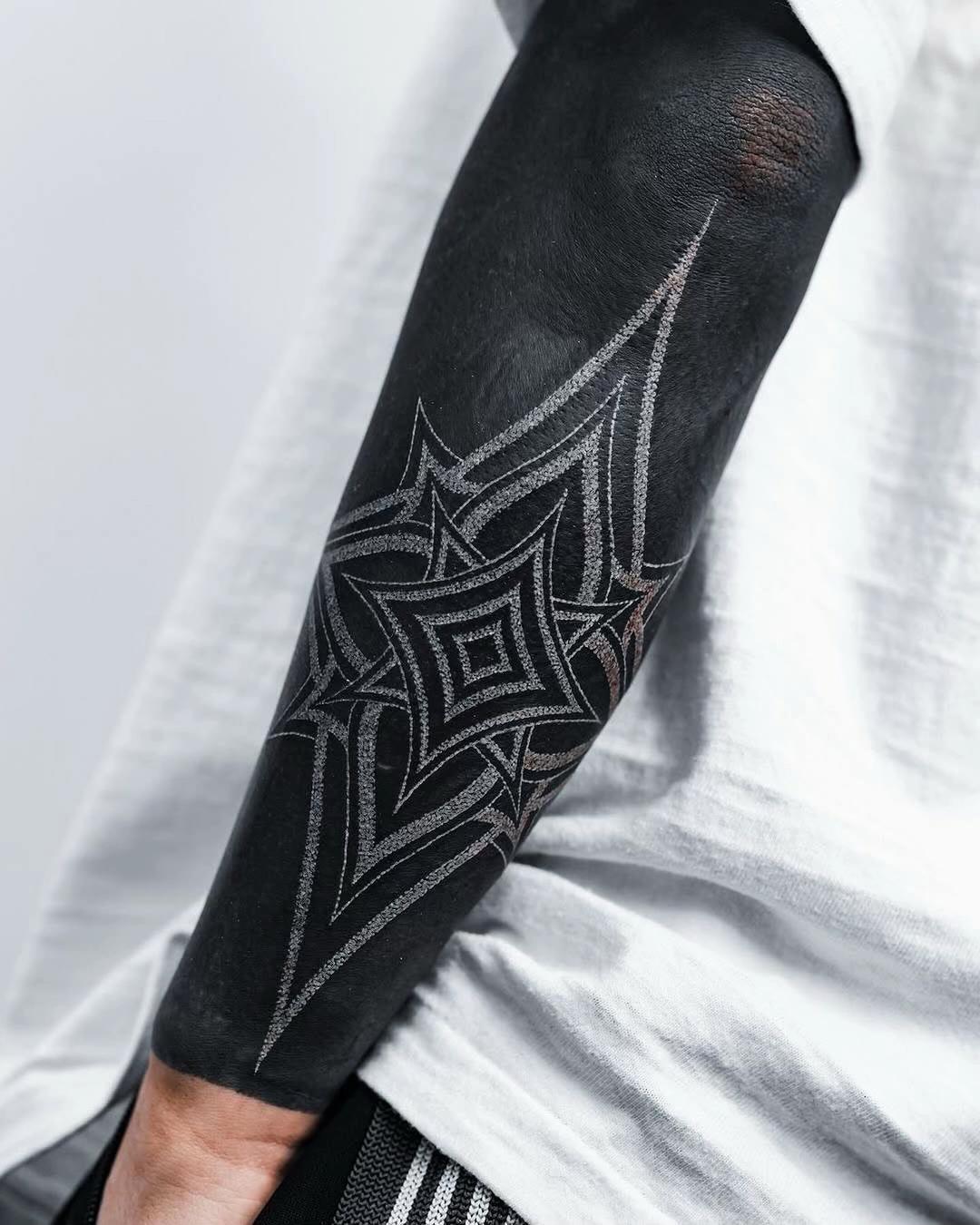 @WHITE ON BLACK TATTOO