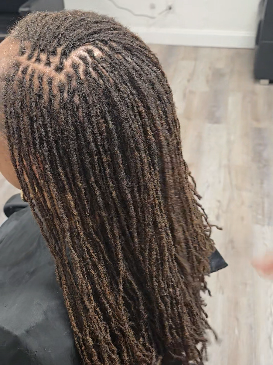 @Mukisa Locs